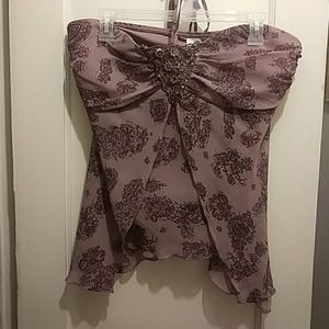 Purple sleeveless dressy top. Rayon.